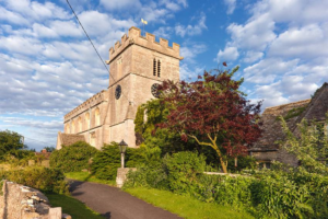 Photograph of a castle style cathedral in a country village